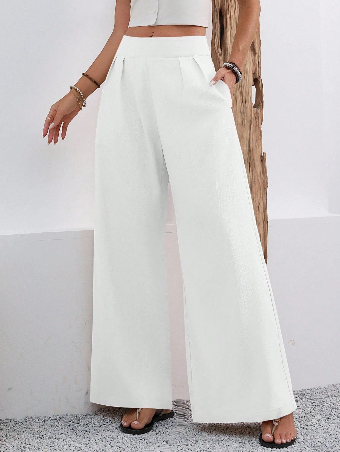 ZOFIA ATELIER white polyester wide-leg trousers with high waist and pockets, full length.
