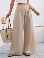 ZOFIA ATELIER beige polyester high-waisted wide-leg trousers with pockets, full-length, elegant style.
