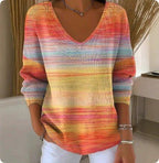 ZOFIA ATELIER WIESŁAWA art print V-neck top with a colorful striped pattern in orange, yellow, blue, and pink hues.