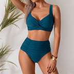 ZOFIA ATELIER Wioletta high-waist teal blue bikini with ruched sides and twisted front top. Nylon and Spandex blend.