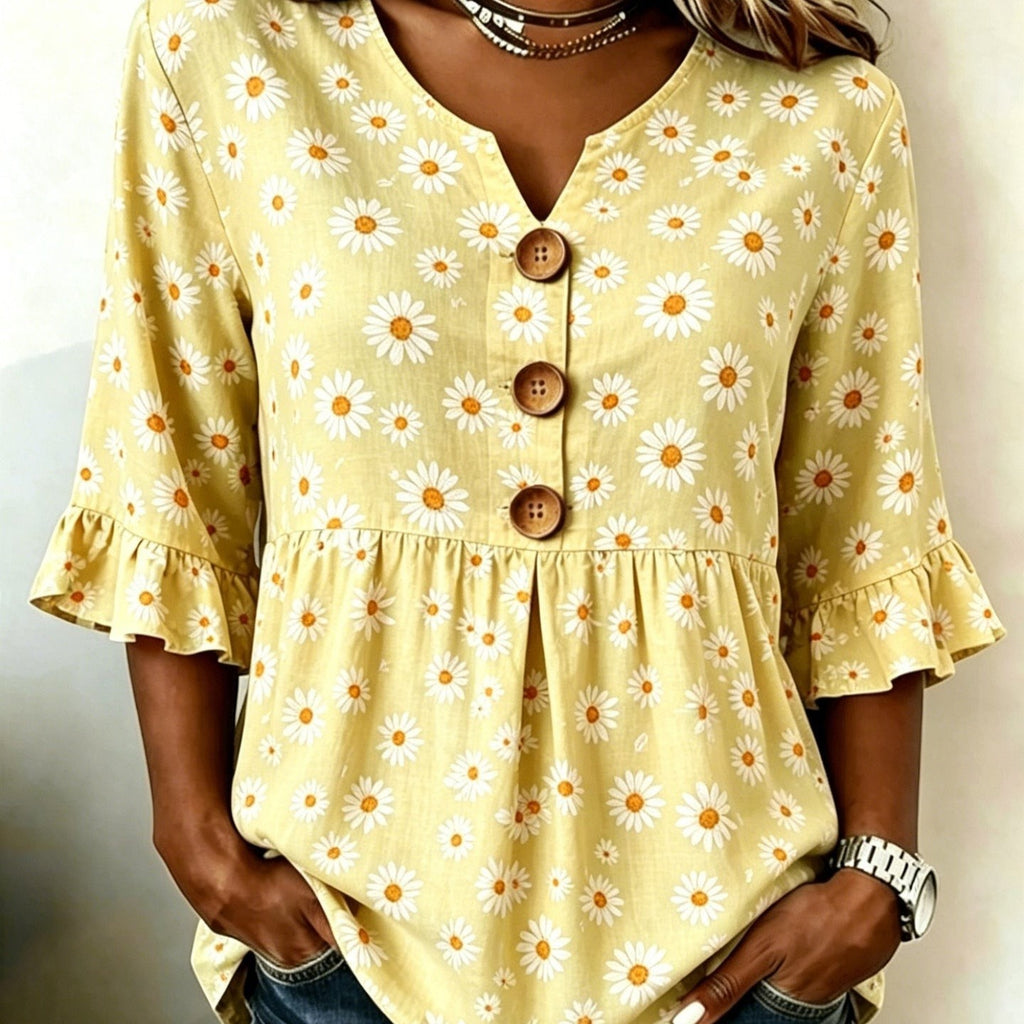 ZOFIA ATELIER yellow short-sleeved polyester top with a daisy print, V-neck, and ruffled sleeves.