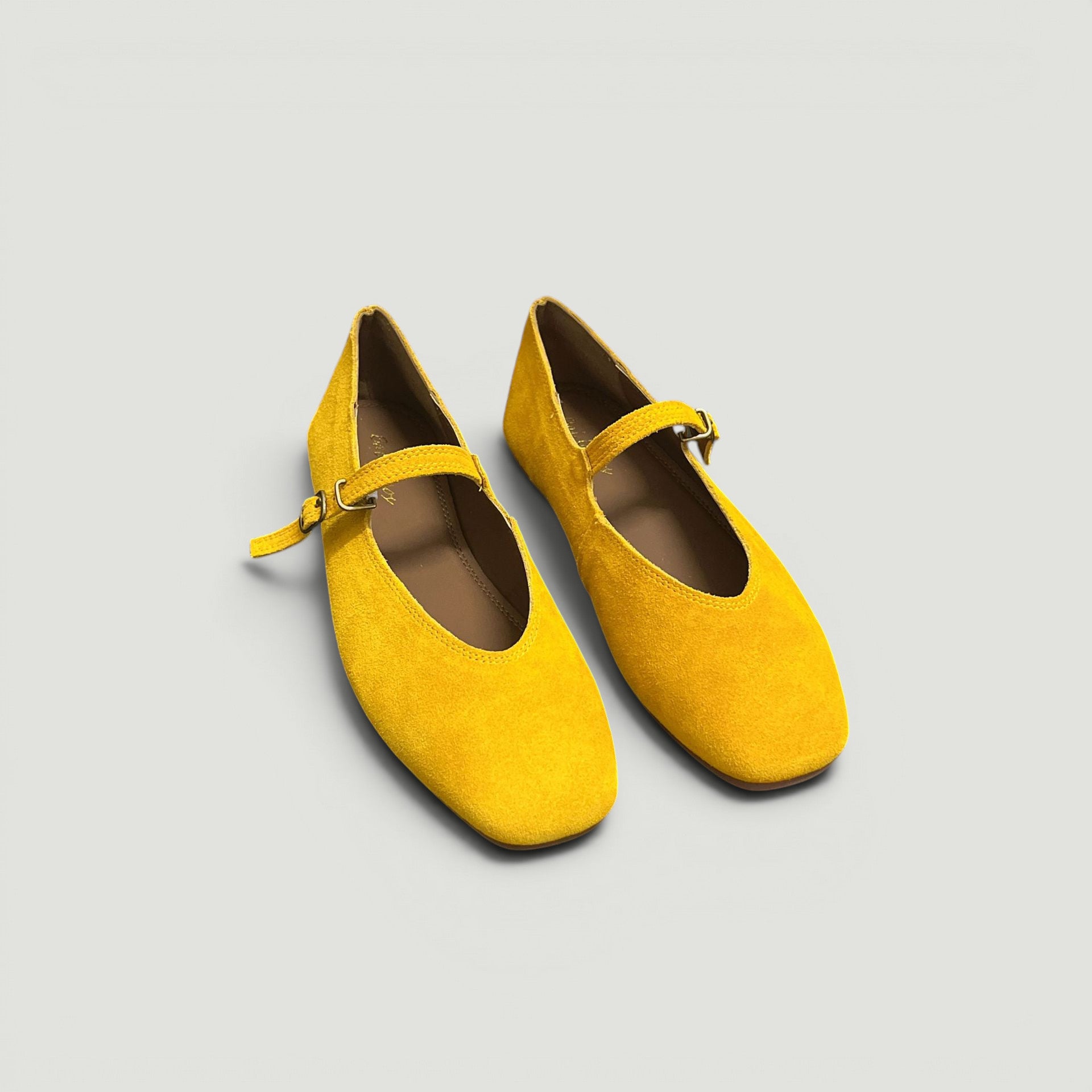 ZOFIA ATELIER yellow suede flat square toe Mary Jane pumps with ankle strap and buckle.