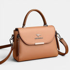 ZOFIA ATELIER ZYTA crossbody shoulder bag in light brown genuine cowhide leather with silver kangaroo logo.